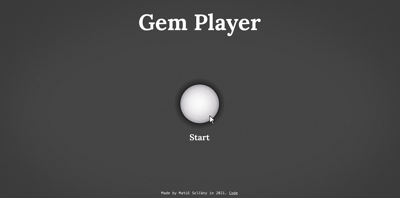 A screen with gray background and a white button in the middle